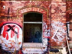 Old, brick factory building with colorful graffities in Plagwitz, Leipzig, Germany