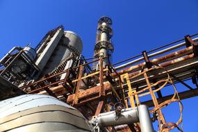 Abandoned industrial plant in Vratsa, Bulgaria, under the blue sky