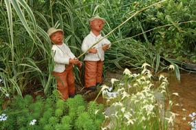 Clay figures of the fishermen, on the beautiful and colorful shore in the Republic of Korea