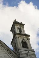 Church Tower Bell at cloudy sky