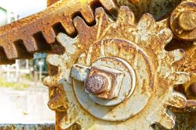 Close-up of the old, rusty, metal gears, together