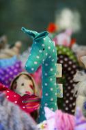 textile dolls in a blurred background