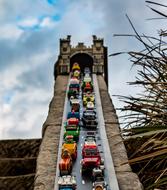 Colorful, toy cars on the bridge