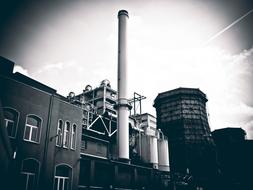 monochrome photo of Industrial Plant Chimney Industry
