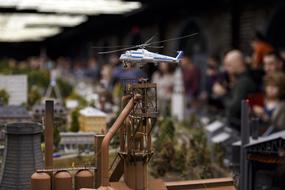 Layout of a helicopter, above the beautiful city, on landscape