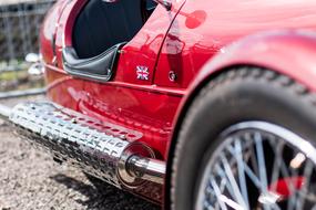 retro red Car with british flag