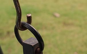 metal coupler on green blurred background