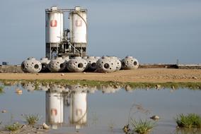 reflection of water tanks in the lake