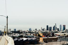 Colorful and beautiful cityscape with the buildings and warehouses, under the cloudy sky