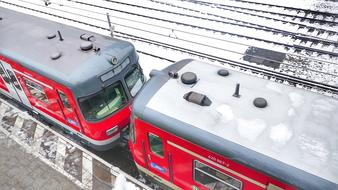 Red and grey Et 420 trains on the railway in Munich, Germany