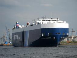 large cargo ship in the port of hamburg on a sunny day