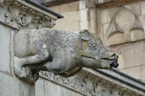 Beautiful gargoyle statue on the patterned cathedral in Toul, France