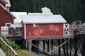 figures of crabs as decoration on houses in alaska