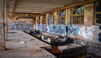 abandoned factory with graffiti on the walls