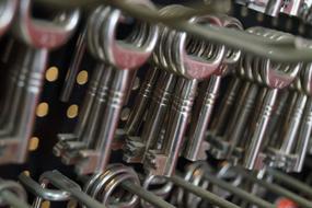 Close-up of the shiny, metal keys in the key service