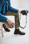photographer with camera ledge