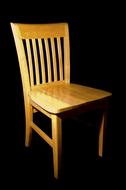 wooden chair in the dark