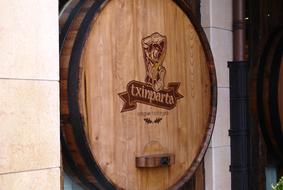 barrel of cider in the wall