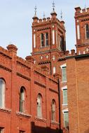 Brick confederate building, under the blue sky with white clouds