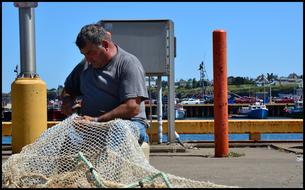 Fisherman Fishing Net