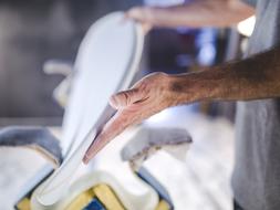 white disk in male hands