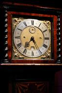 vintage clock in wooden frame