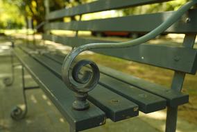 wooden bench with metal structure