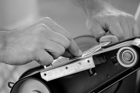 Craftsmen Sharpen Knife