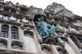 creative statue on the facade, bottom view