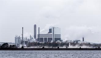 smoke over Industrial plant on waterside