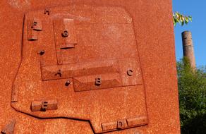 Rusty Iron Sculpture close-up on a sunny day