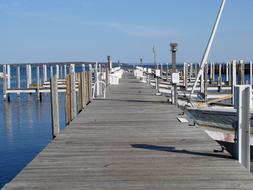 docks on a wooden pier on lake michigan