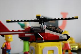 a helicopter from the Lego constructor on a blurred background