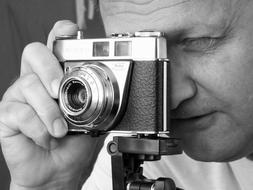 photographer with old camera close-up
