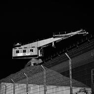monochrome photo of Crane Load Lifting