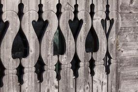 wooden fence in a heart shape close up