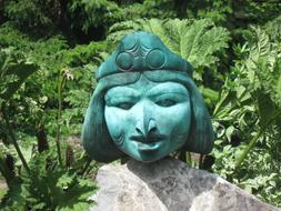 sculpture with a bronze female head, woodinville