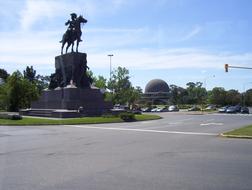 sculpture of a rider on a horse in the city center