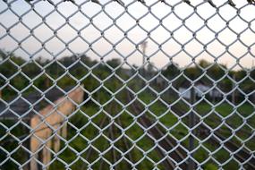 industrial fence, metal grill