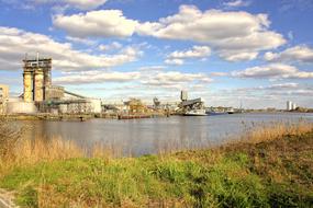 industry in a picturesque landscape near the river