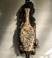 decor in the form of a vase of seashells
