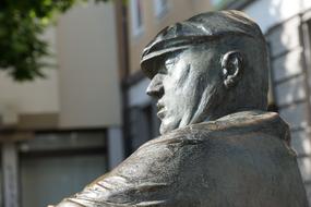 statue of a man in a peaked cap in germany