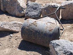 Leveler Roller Tool among the big stones