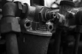 Black and white photo with the old, industrial machine