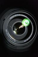 Camera Lens close-up on black background