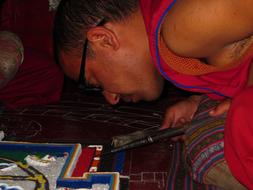 Monk, preparing, beautiful and colorful, patterned mandala