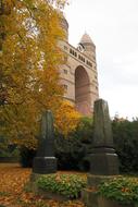 Beautiful building among the colorful plants, in the autumn