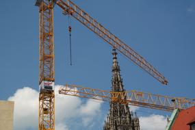 Site Construction Cranes at blue sky