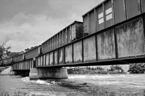 Black And White photo of Train Bridge railway