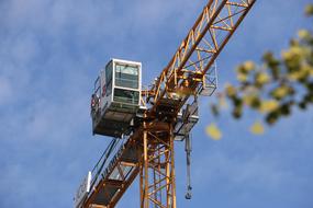 tower Construction Crane boom and cabin at sky